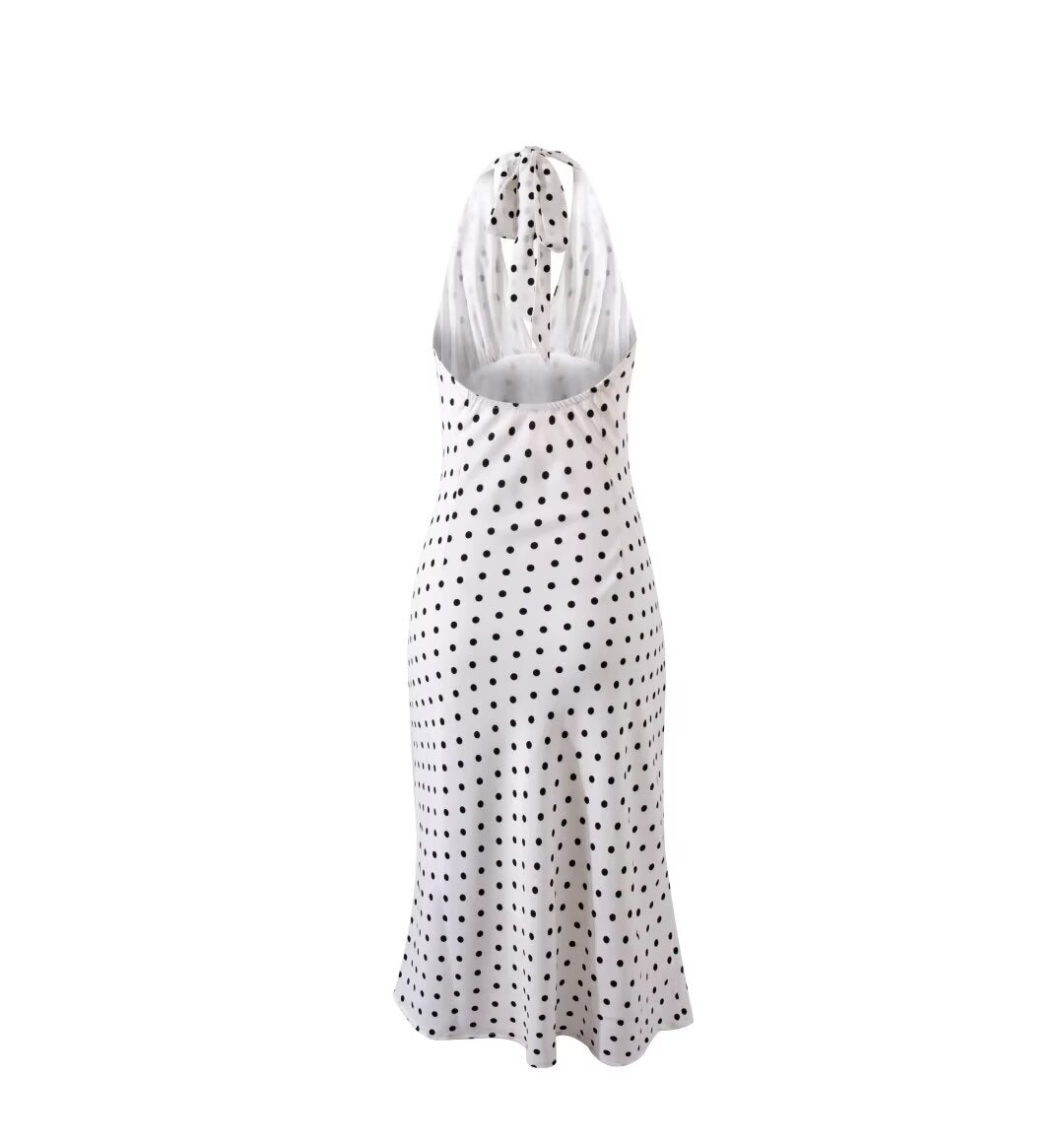 A white dress with polka dots made for summer; backless