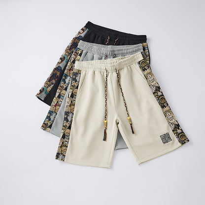 Unisex Shorts mit lockerem Schnitt und bestickten Seitenpanelen