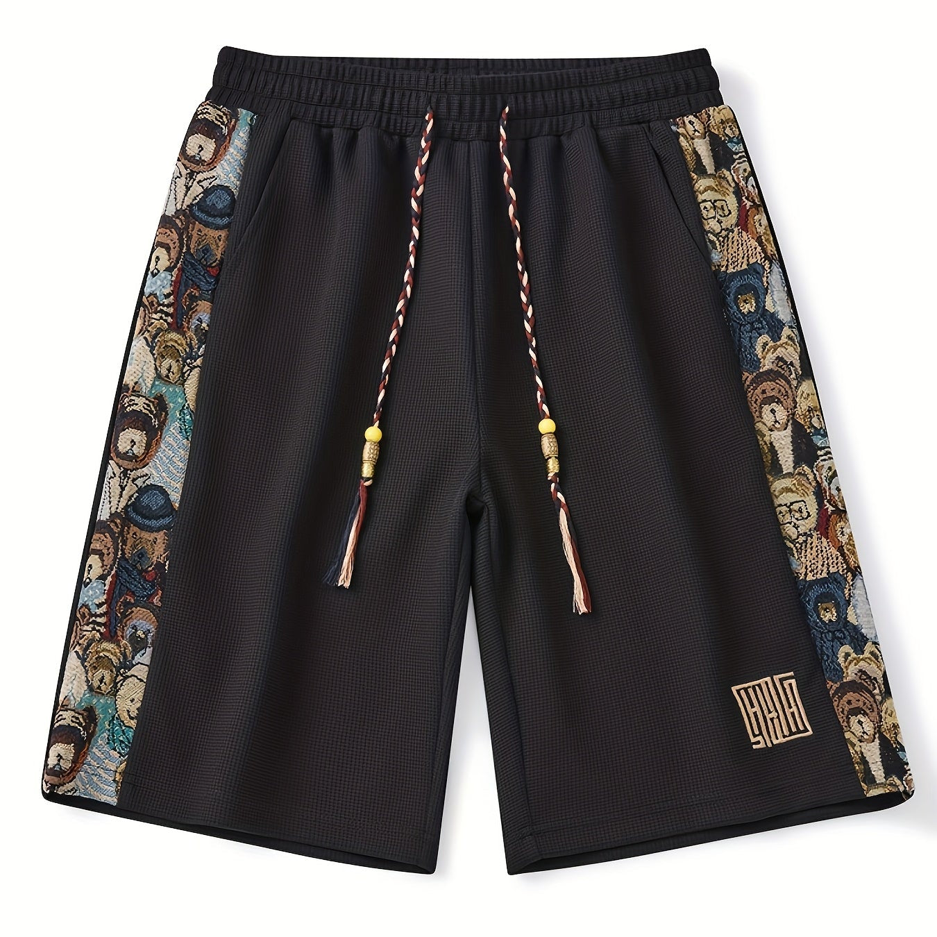 Detailaufnahme der bestickten Seitenpanelen an den Unisex Shorts