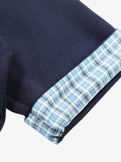 Baumwoll-Piqué-Poloshirt mit kariertem Kontrastkragen und -manschetten