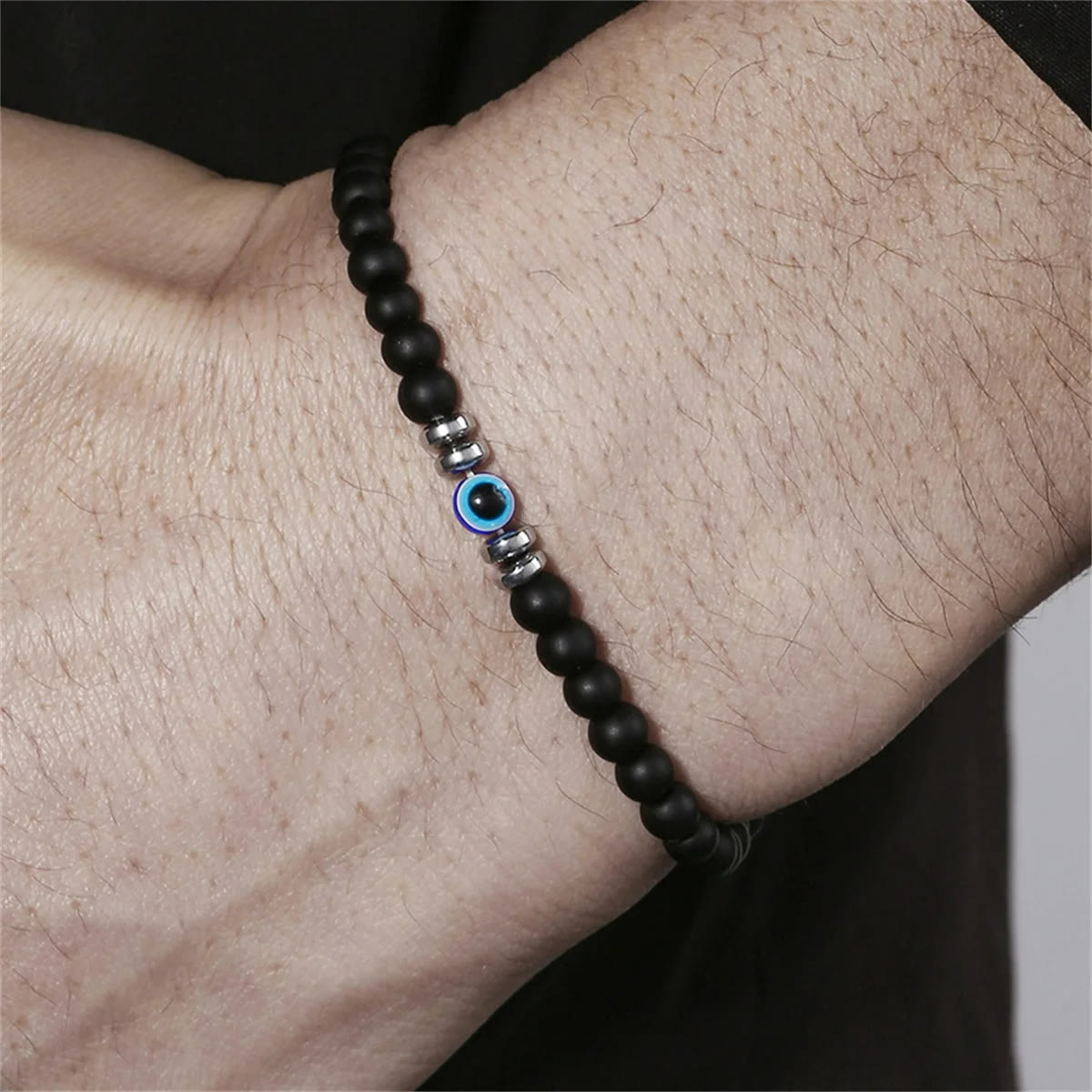Herrenarmband aus Naturstein mit bösem Blick und Perlen