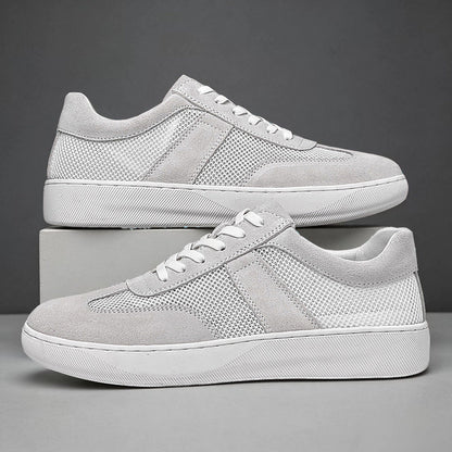 Unisex Sneaker in Kobaltblau, Detailaufnahme von Mesh, Schnürsenkeln und Nähten