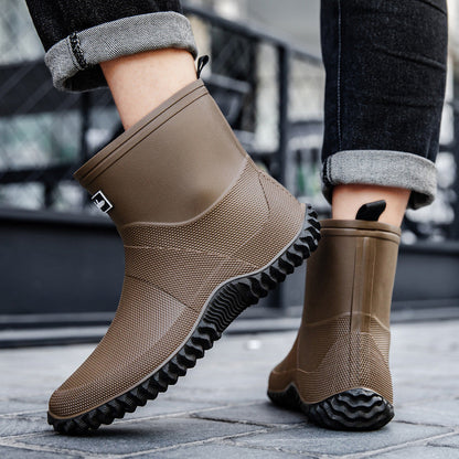 Herren-Gummistiefeletten mit markanter Profilsohle von der Seite