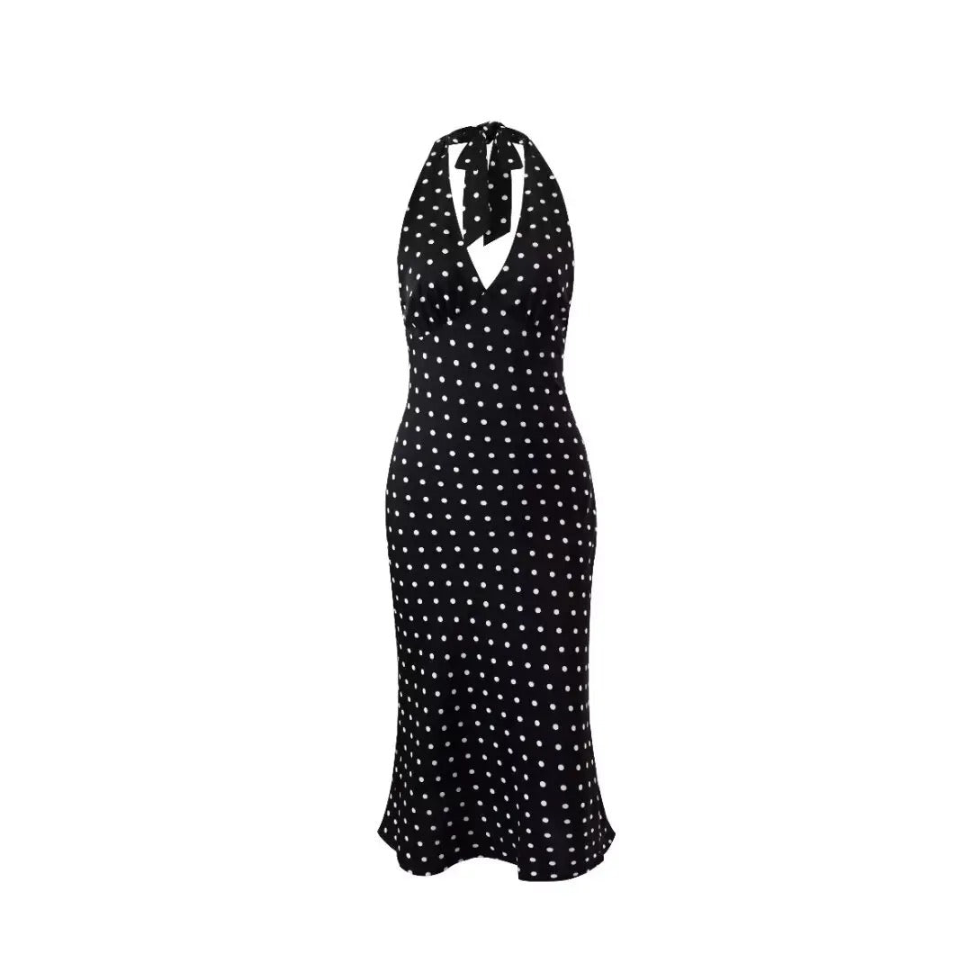 A backless summer dress with white dots