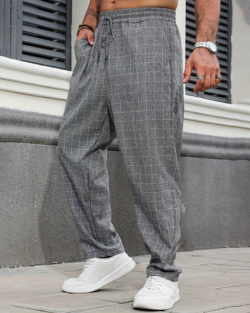 Nahaufnahme des karierten Stoffmusters und Bunds der Herrenhose mit Taschen