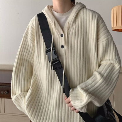 Detailaufnahme der Waffelstruktur an einer Herren-Strickjacke