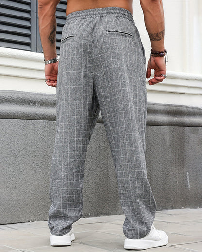 Detail der karierten Herrenhose mit geradem Schnitt und praktischem Taschenbereich