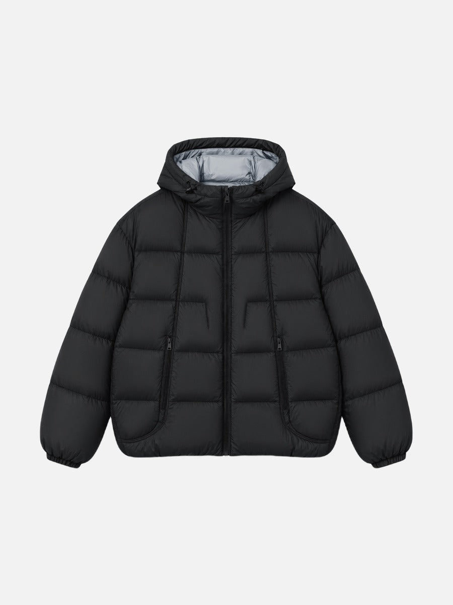 Oversized Steppjacke mit wärmender Wattierung und Kontrastfutter in der Vorderansicht