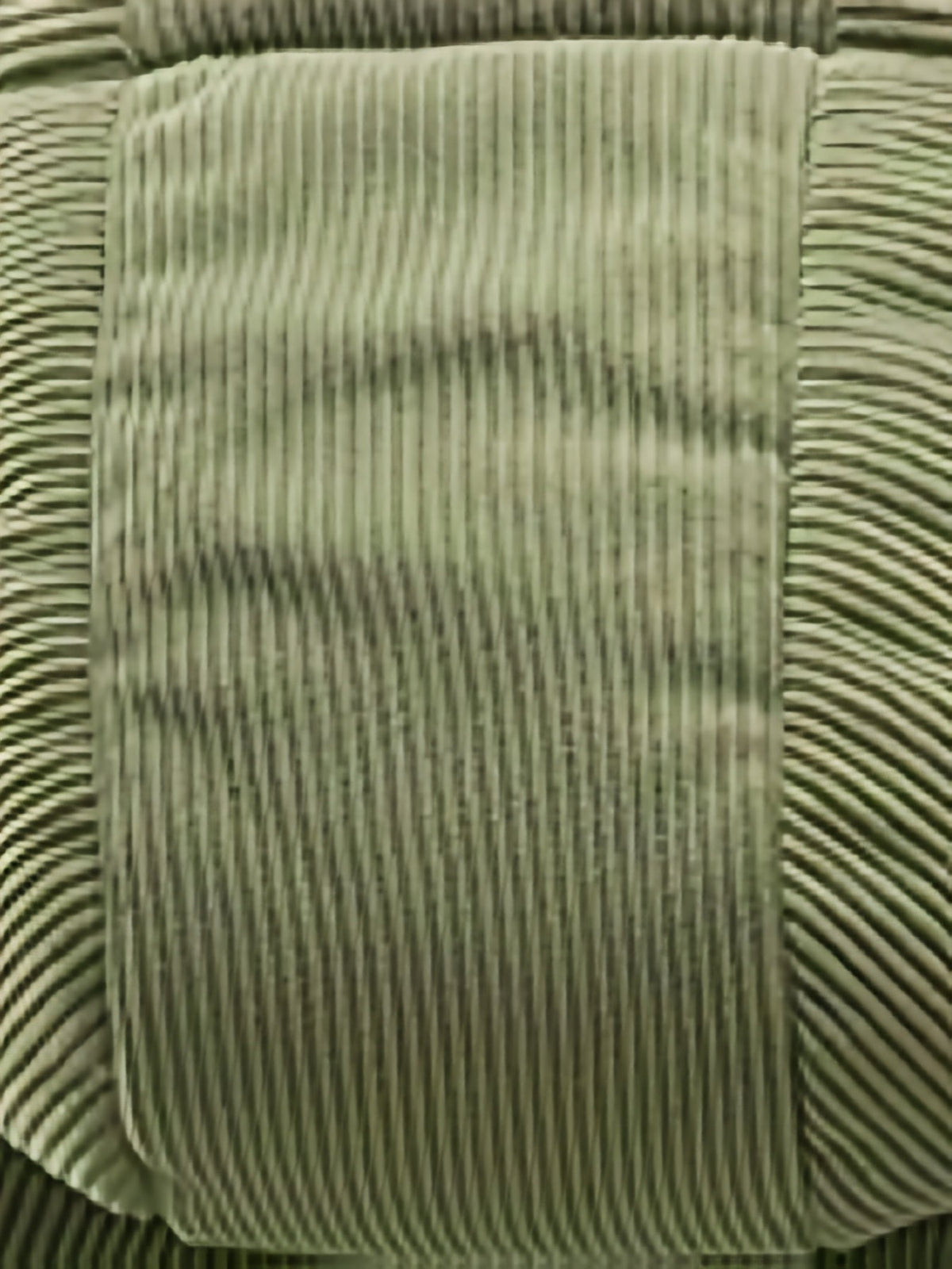 Detailaufnahme der Stoffstruktur der Steppjacke