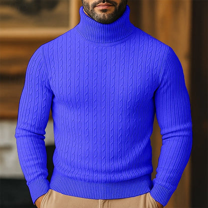 Nahaufnahme des strukturierten Zopfstrickmusters am Pullover